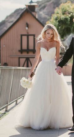 Ivory Spaghetti Straps Tulle Sweetheart Neck Long Wedding Dress On Ivory Spaghetti Straps Tulle Sweetheart Neck Long Wedding Dress